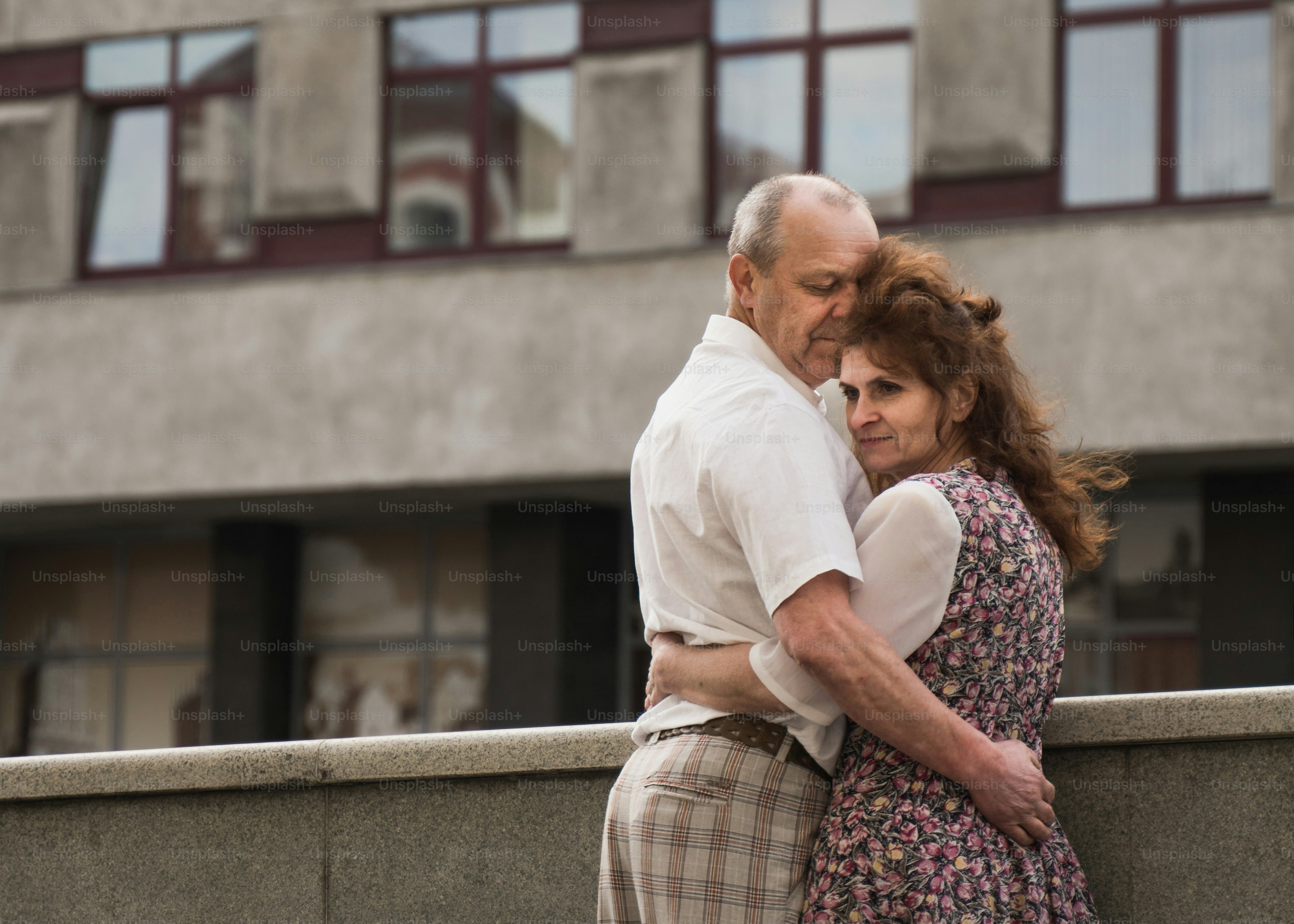 a man and a woman embracing each other