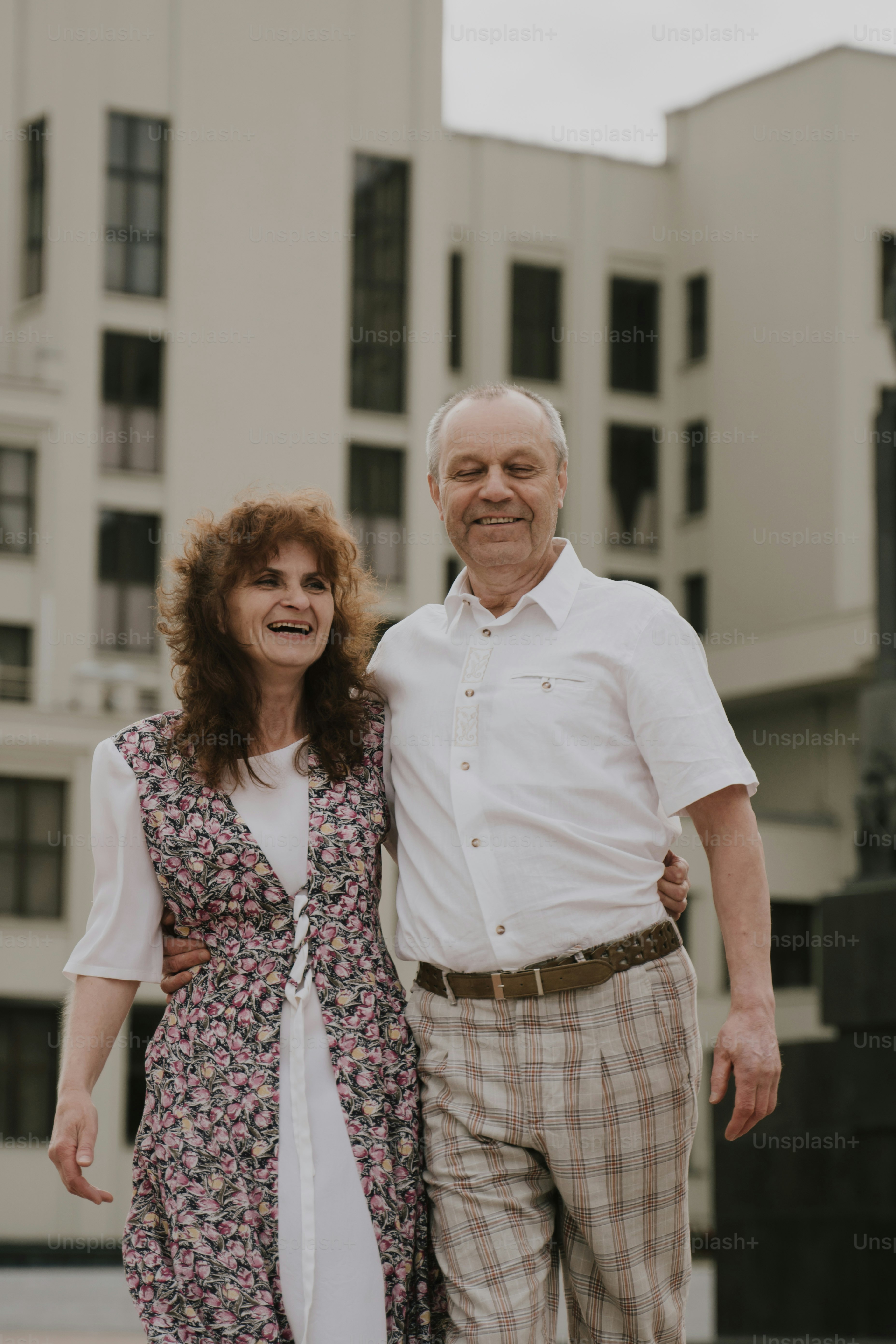 a man and a woman standing next to each other