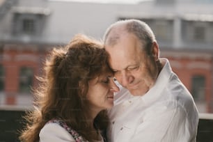 a man and a woman standing next to each other