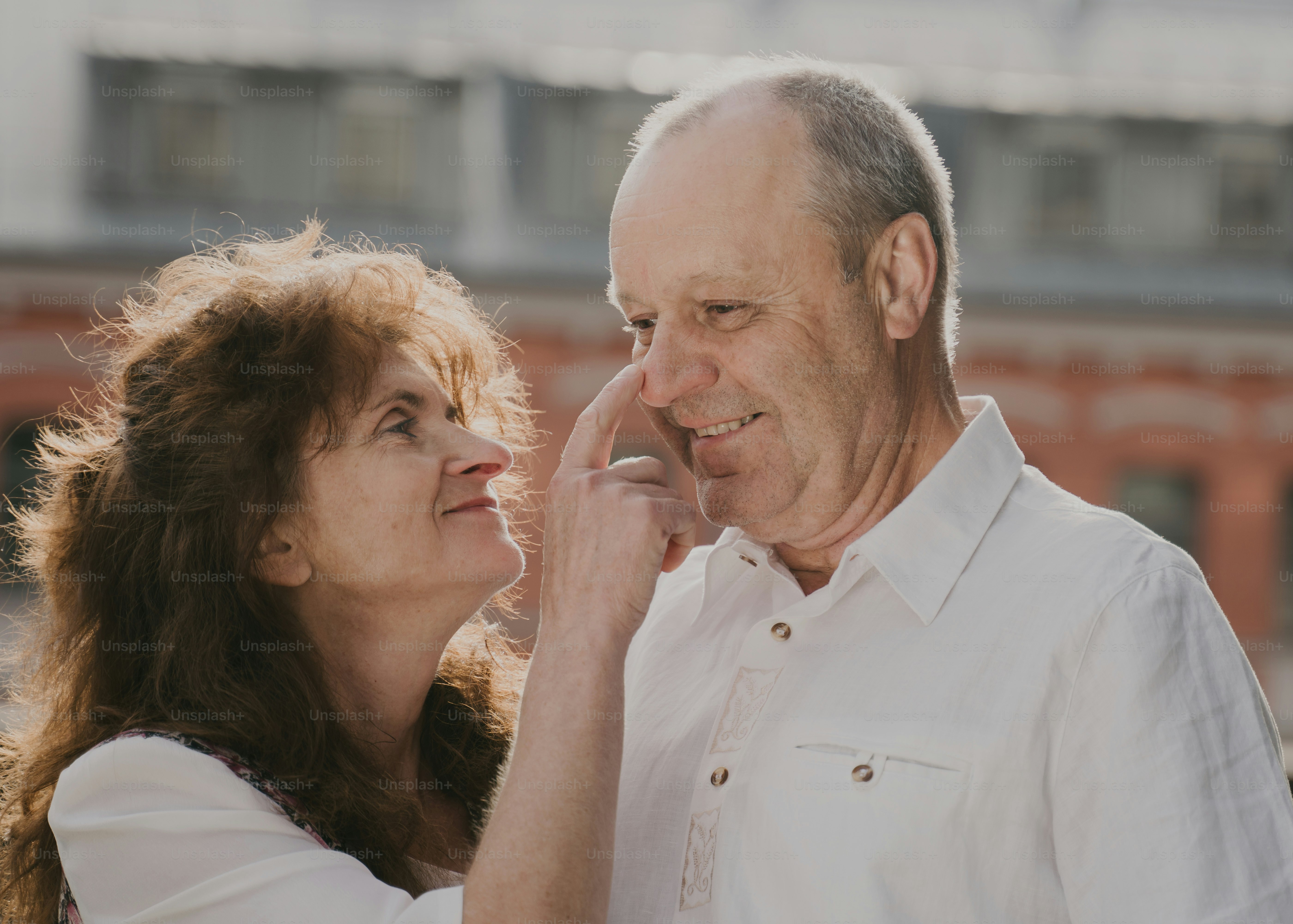 a man and a woman standing next to each other