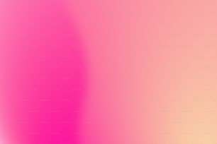 ein verschwommenes Bild mit rosa und gelbem Hintergrund