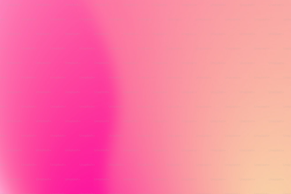 Una imagen borrosa de un fondo rosa y amarillo