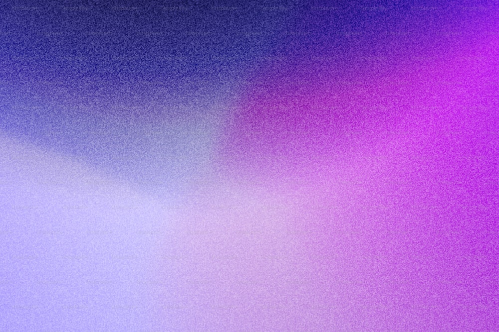 a blurry image of a purple and blue background