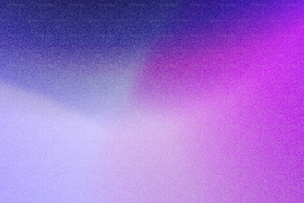 une image floue d’un arrière-plan violet et bleu