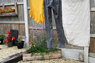 clothes hanging on a clothes line in a garden