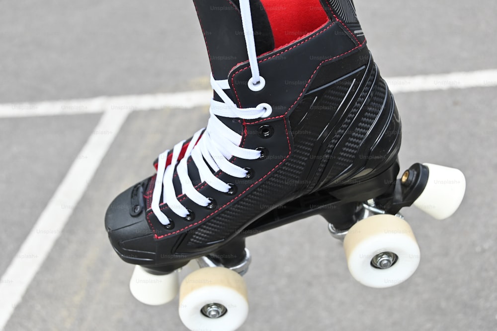 a close up of a person riding a skateboard