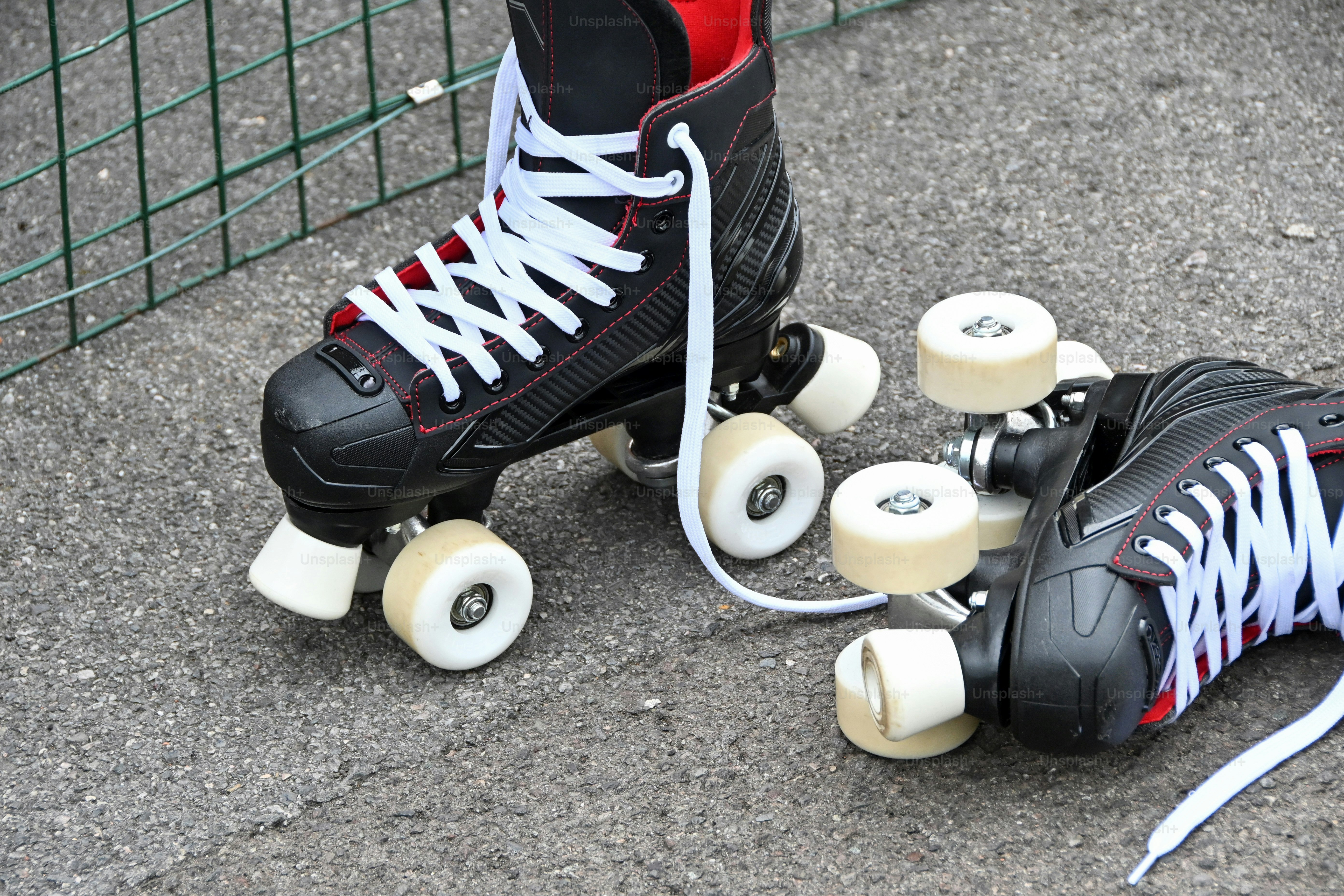 A pair of roller skates sitting next to each other photo Roller