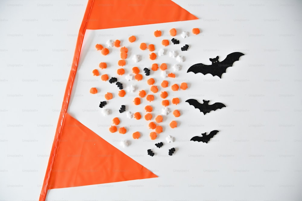 a kite with halloween decorations on it on a table