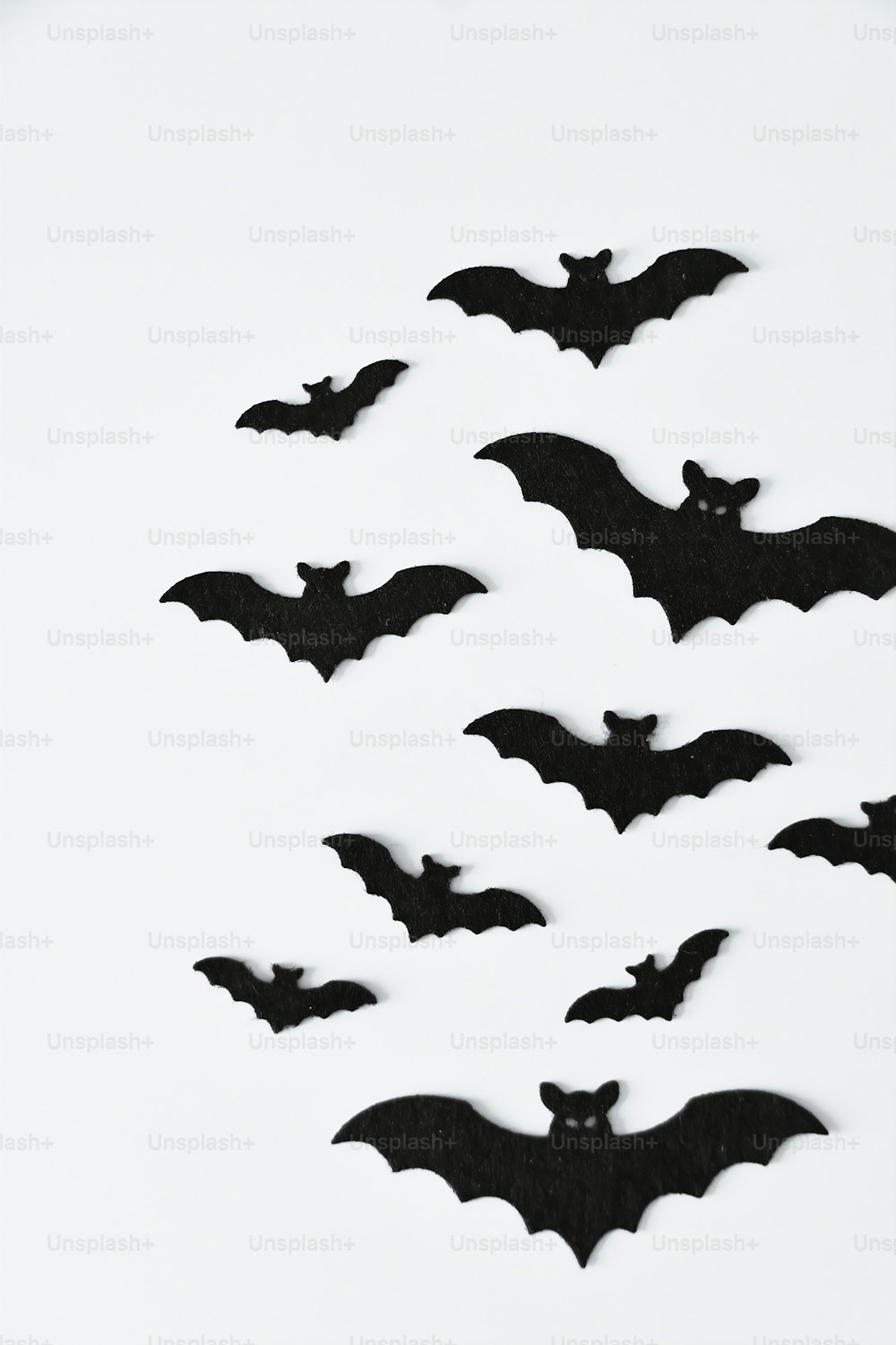 a group of bats flying through the air