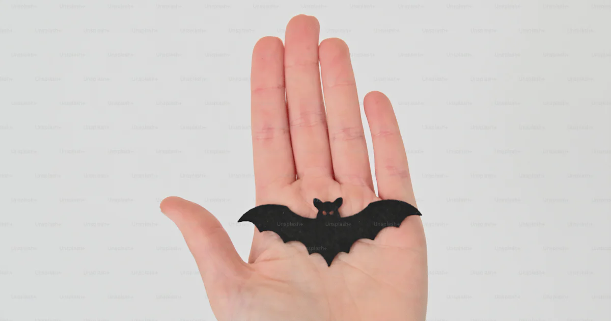 Batfish Hand A person's hand with a bat tattoo on it photo – Wrist Image on Unsplash