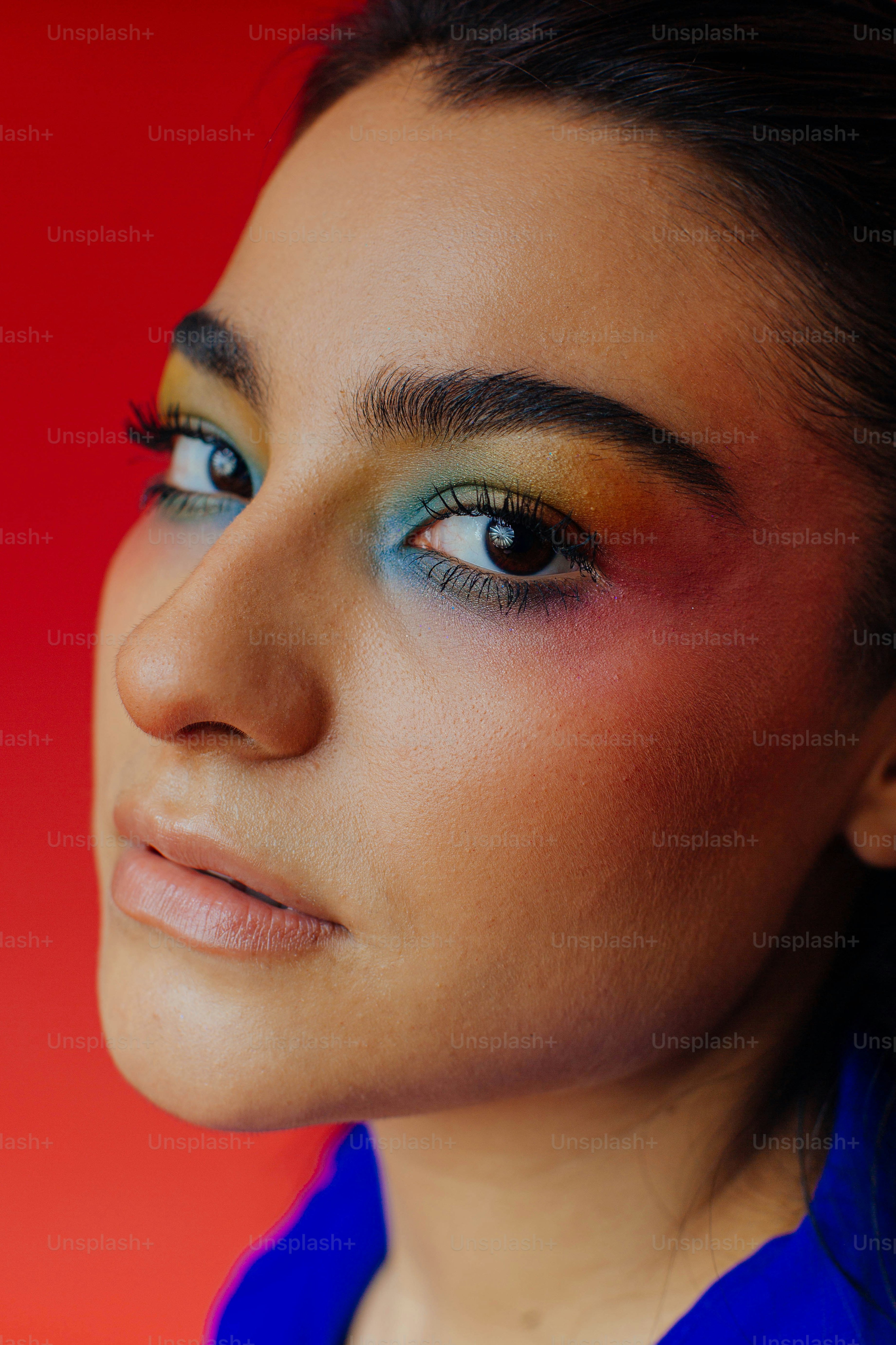 a close up of a person with a blue shirt