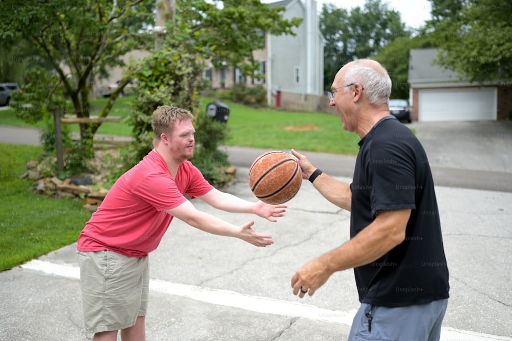 a man holding a basketball in his right hand