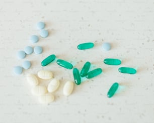 a pile of pills sitting on top of a table