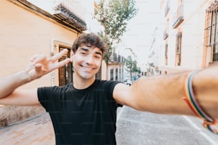 a man making a peace sign with his hands