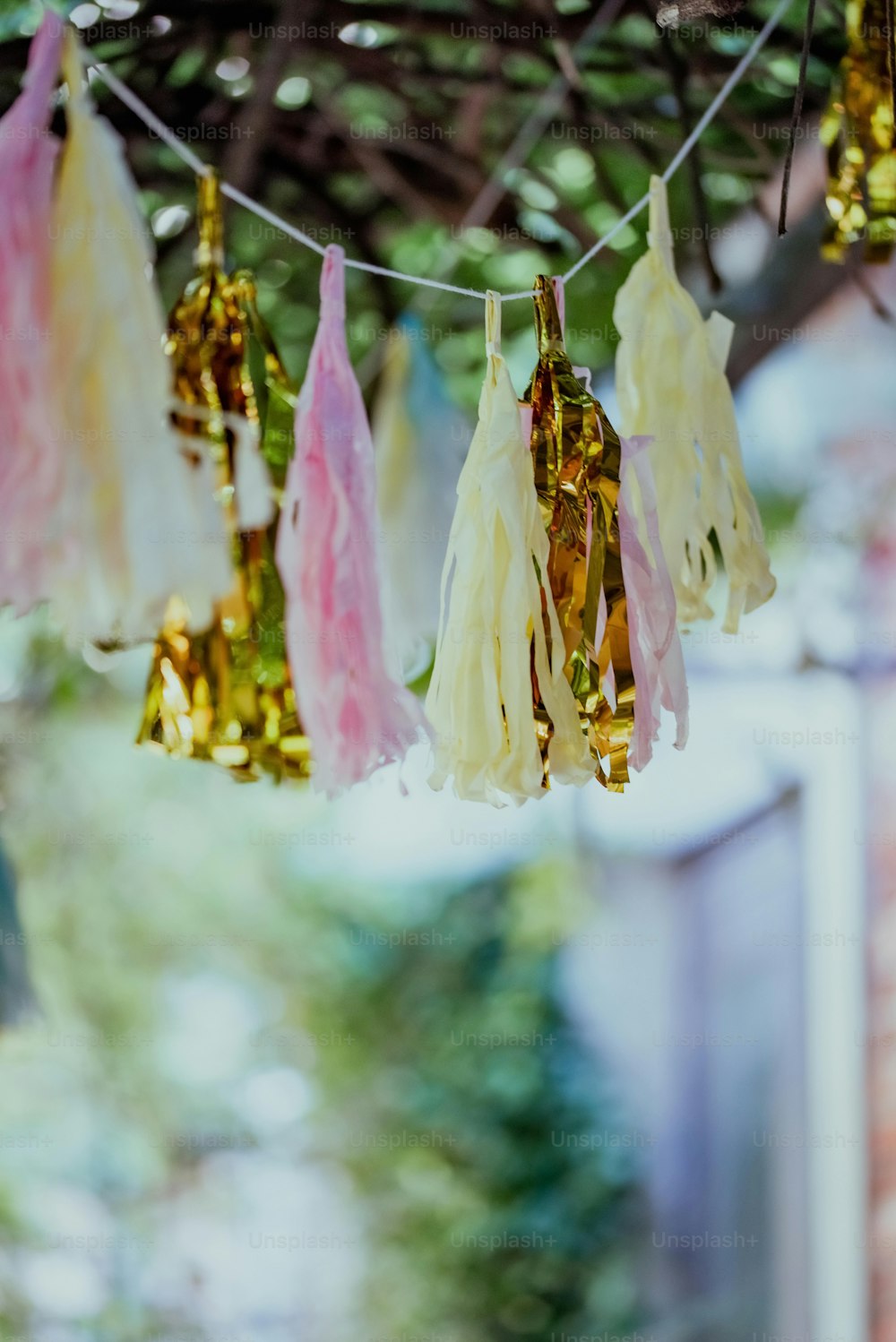 a bunch of tassels hanging from a tree
