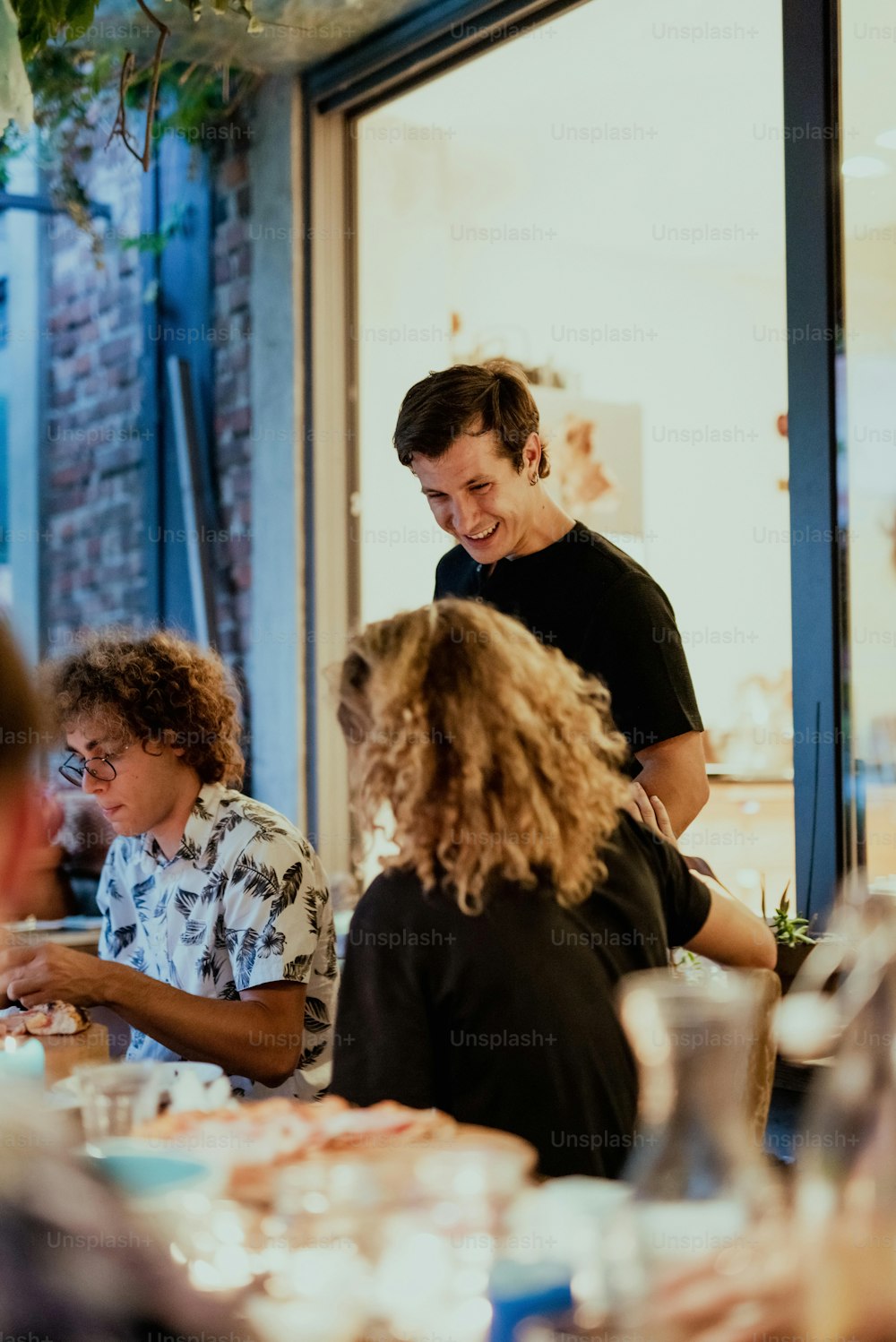 a group of people sitting around a table