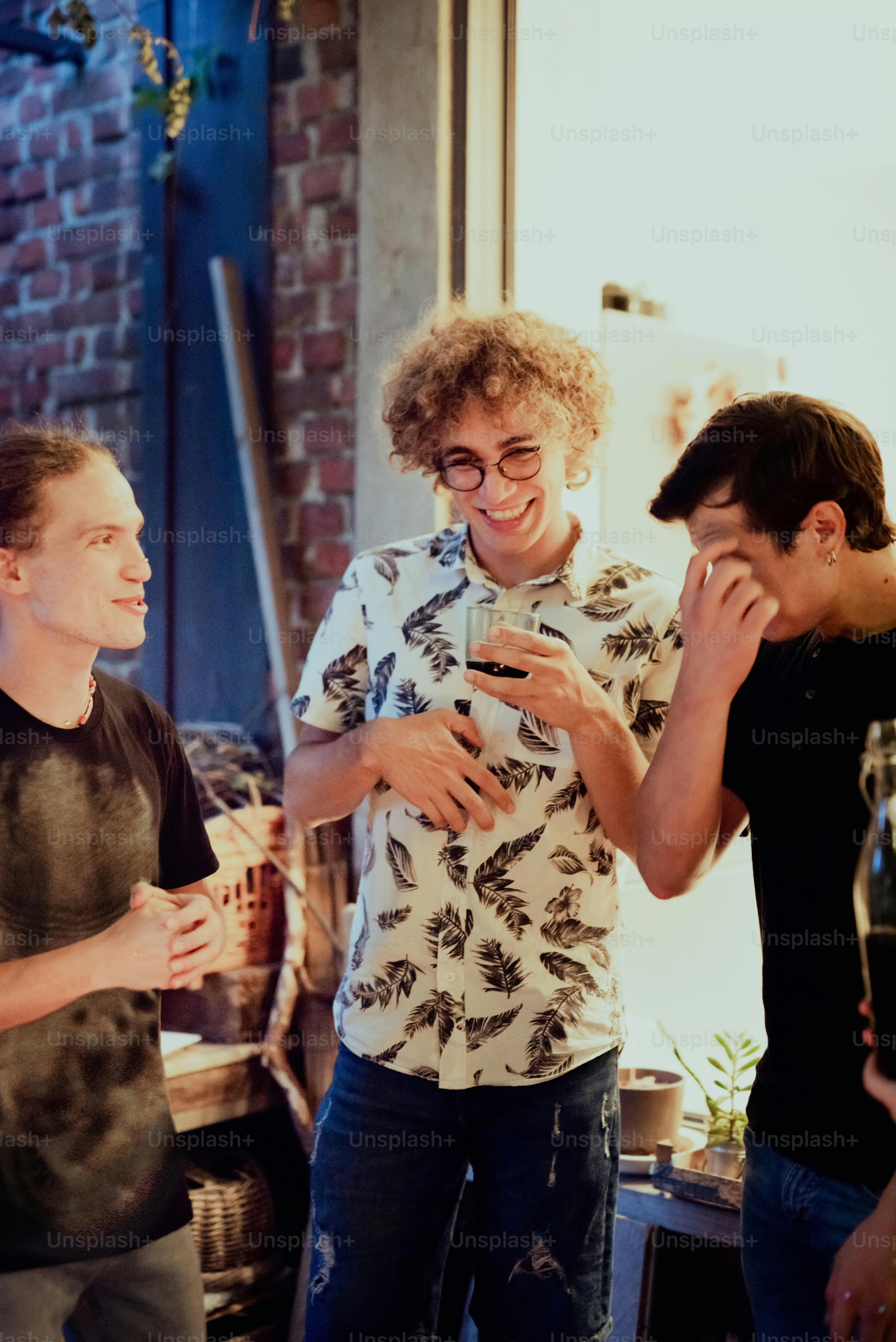 a group of young men standing next to each other