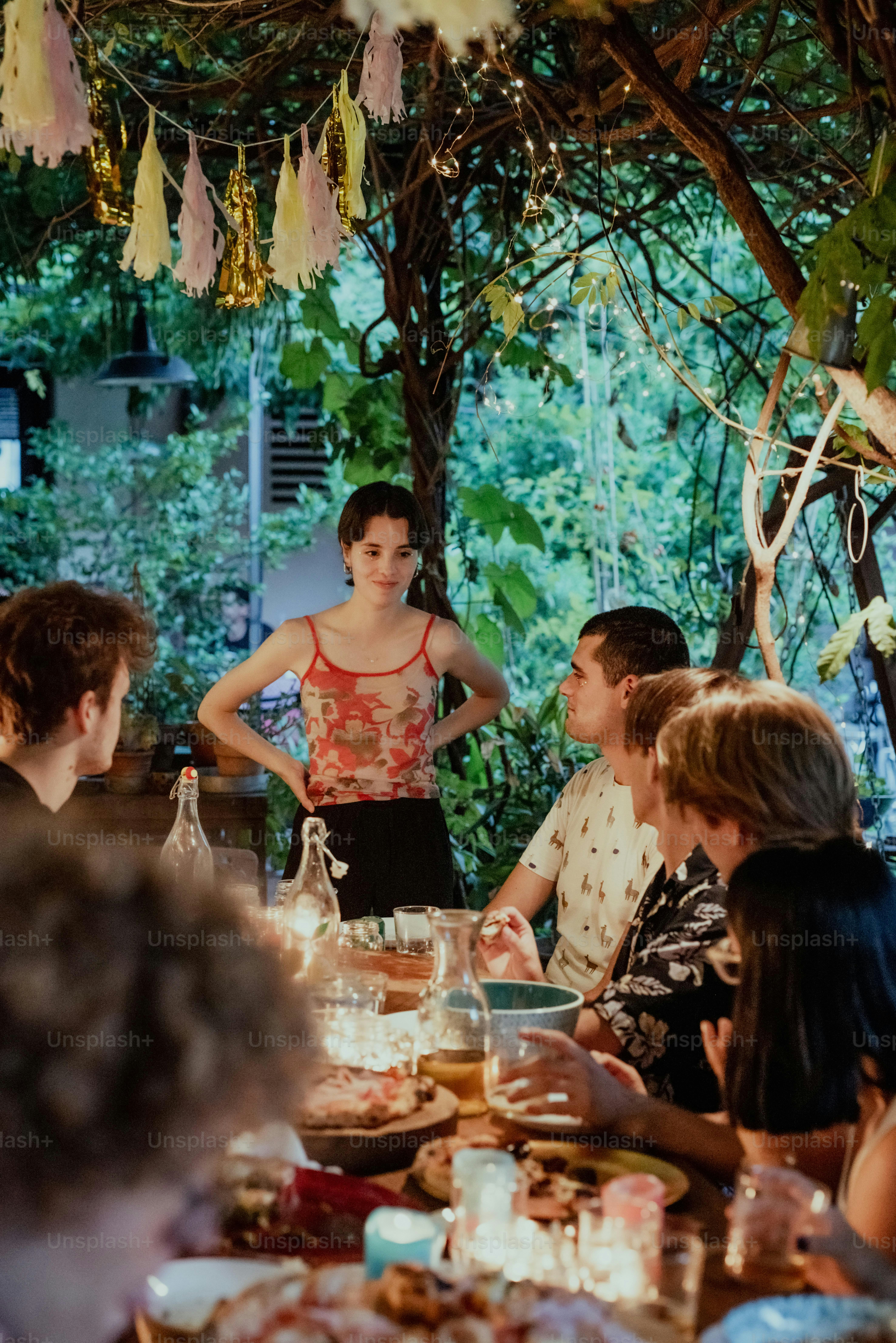 a group of people sitting around a table