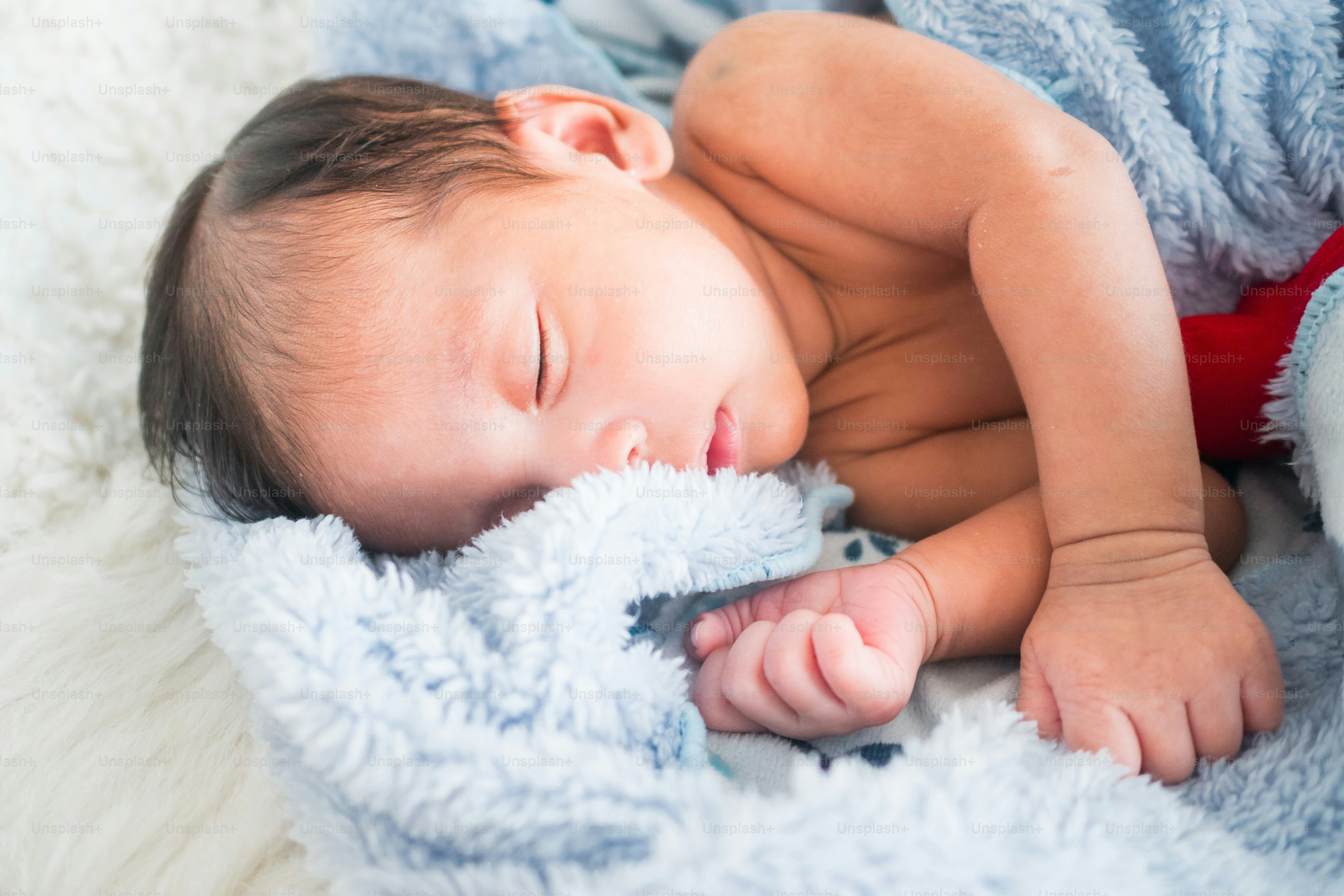 1 month old baby boy is sleeping