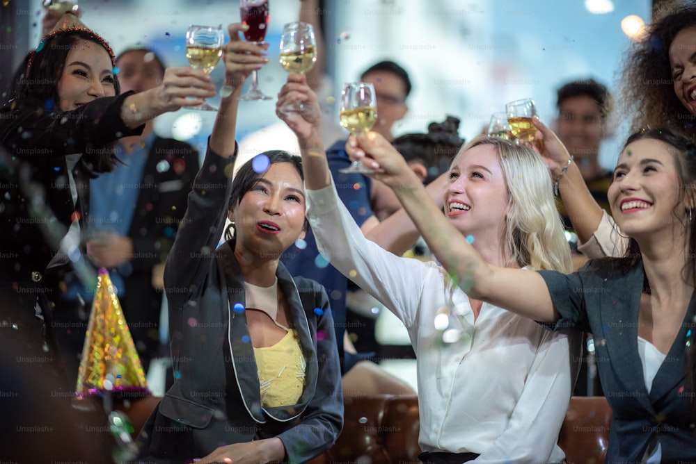 Young business people have fun at a New Year's party 2020