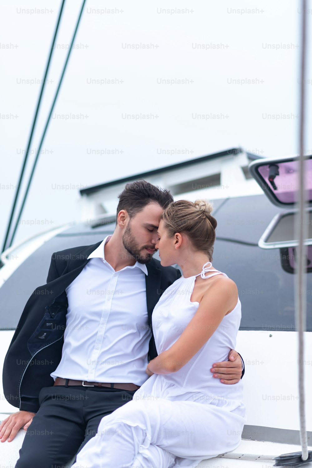 Business couples are celebrating in a yacht, Honeymoon summer trip