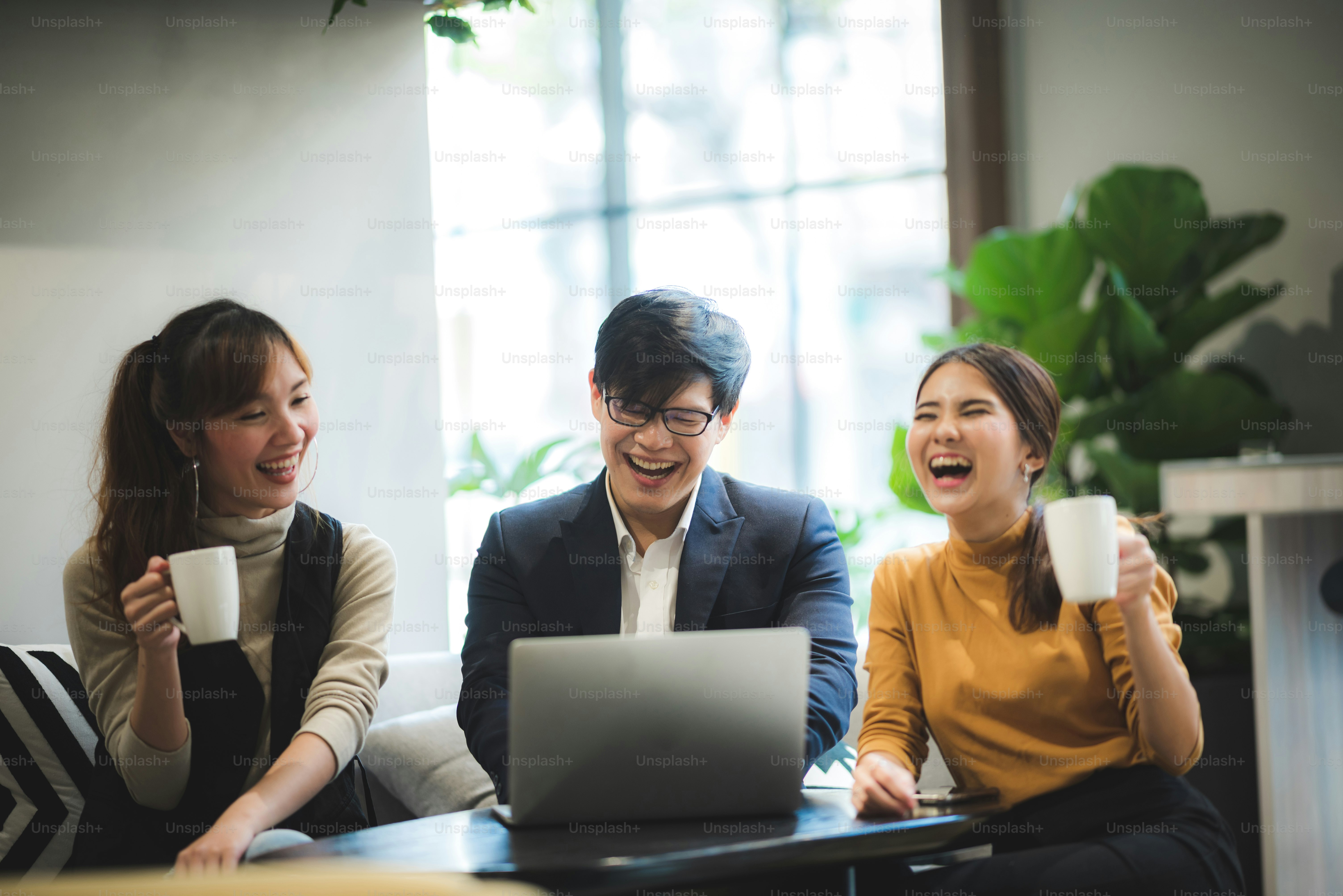 Successful business group of people at work in co-working space office ...