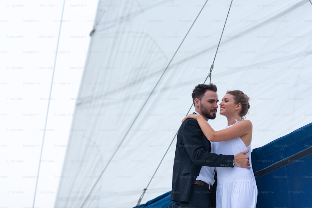 Couples are having fun on a yacht on a luxury honeymoon trip.