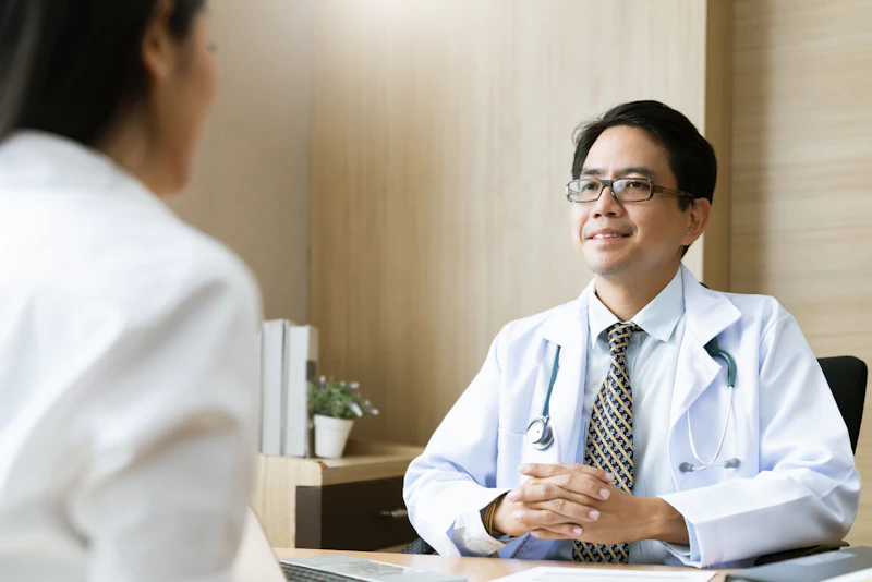Doctor and patient in clinical consultation