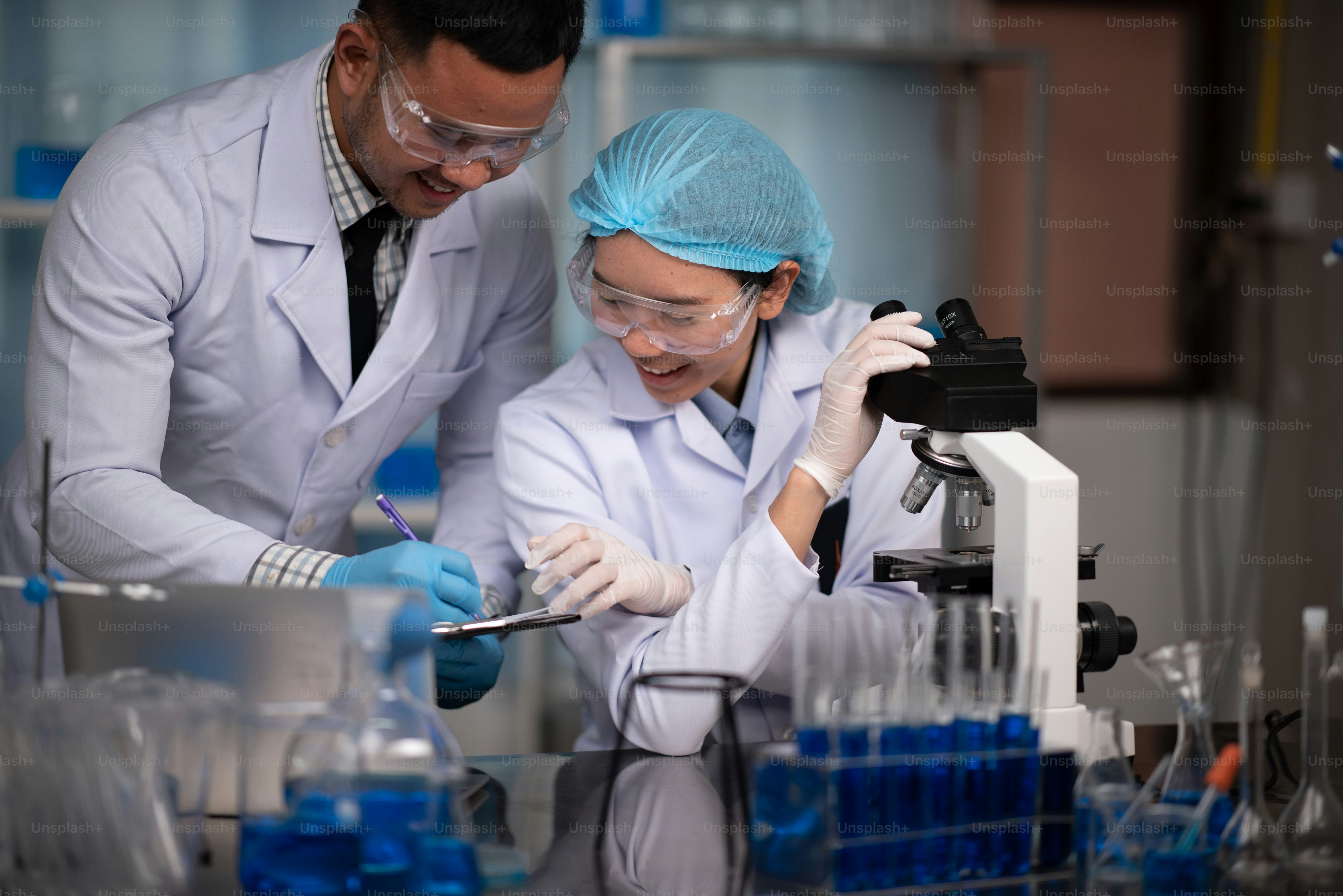 Scientific researchers team are working in the laboratory photo ...