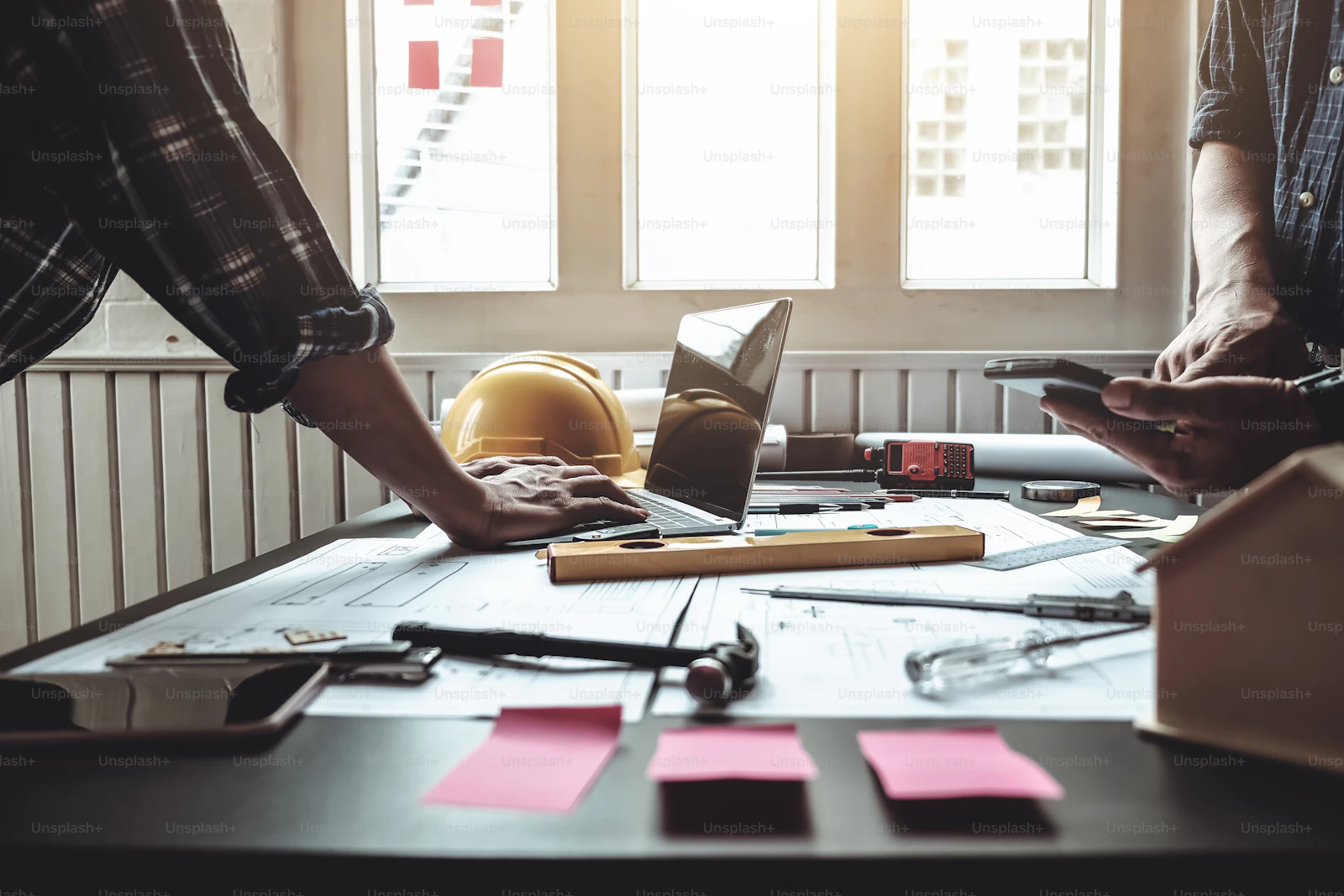Team planning session at a desk for competitive SEO analysis