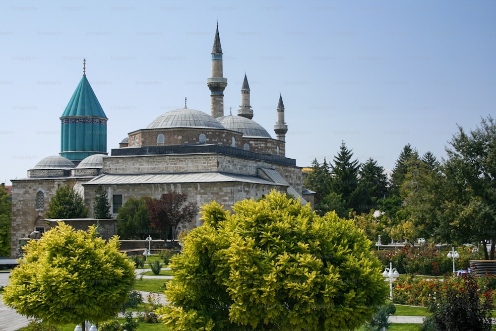 Skyline of Konya with the green dome of the Mausoleum of Mevlana Rumi and Selimiye Mosque, Konya, Turkey.