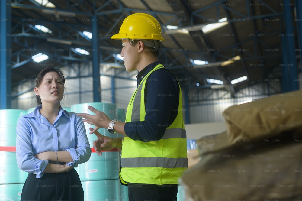 Engineer people are wearing  protective mask working in warehouse