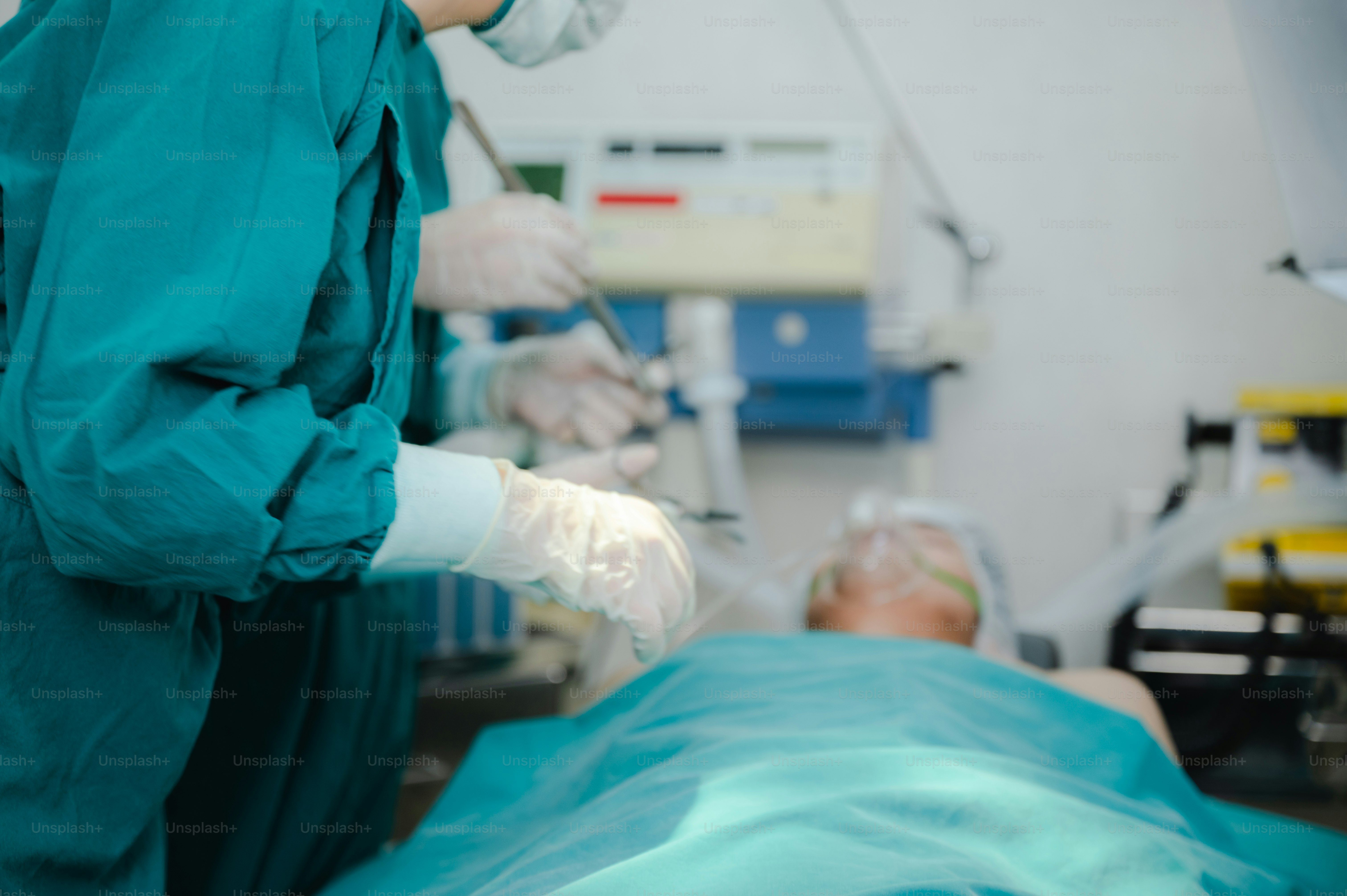 professional surgeon doctor teamwork person working in hospital operation room with surgery medical health equipment with surgical patient and nurse, emergency medicine treatment clinic concept