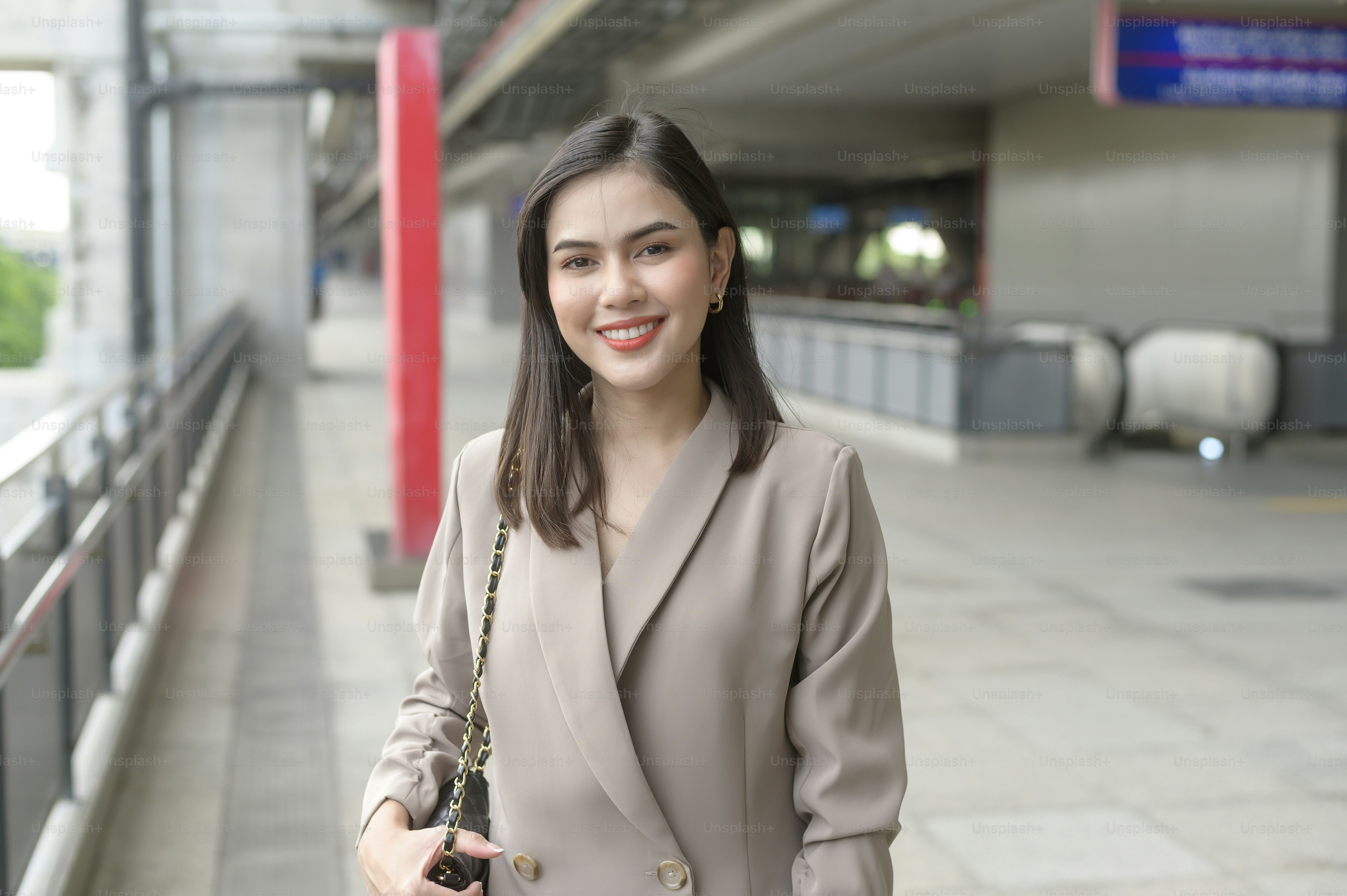 A portrait of beautiful smiling Businesswoman in modern City , people lifestyle concept
