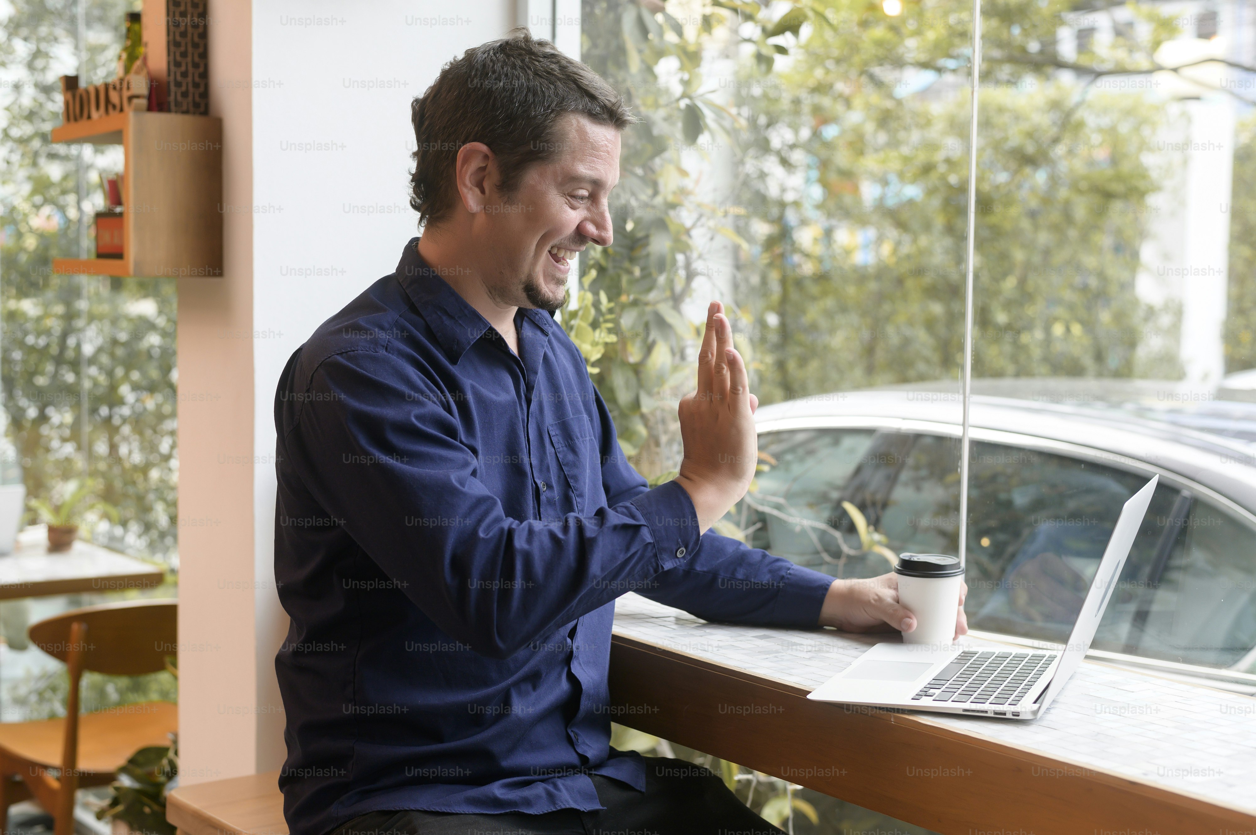 Portrait of business caucasian man in coffee shop