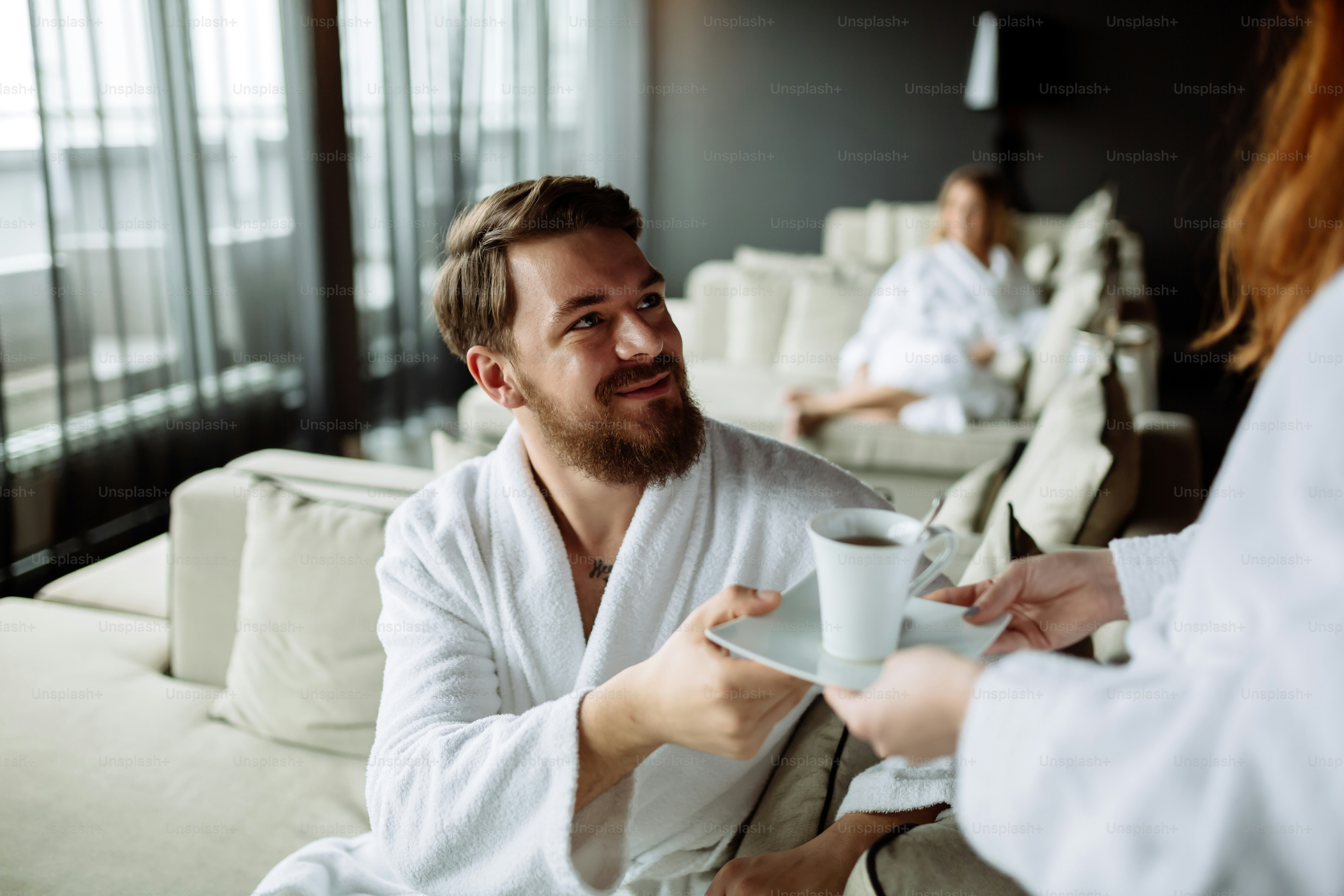 Handsome man drinking tea in morning resting room photo – Healthy ...