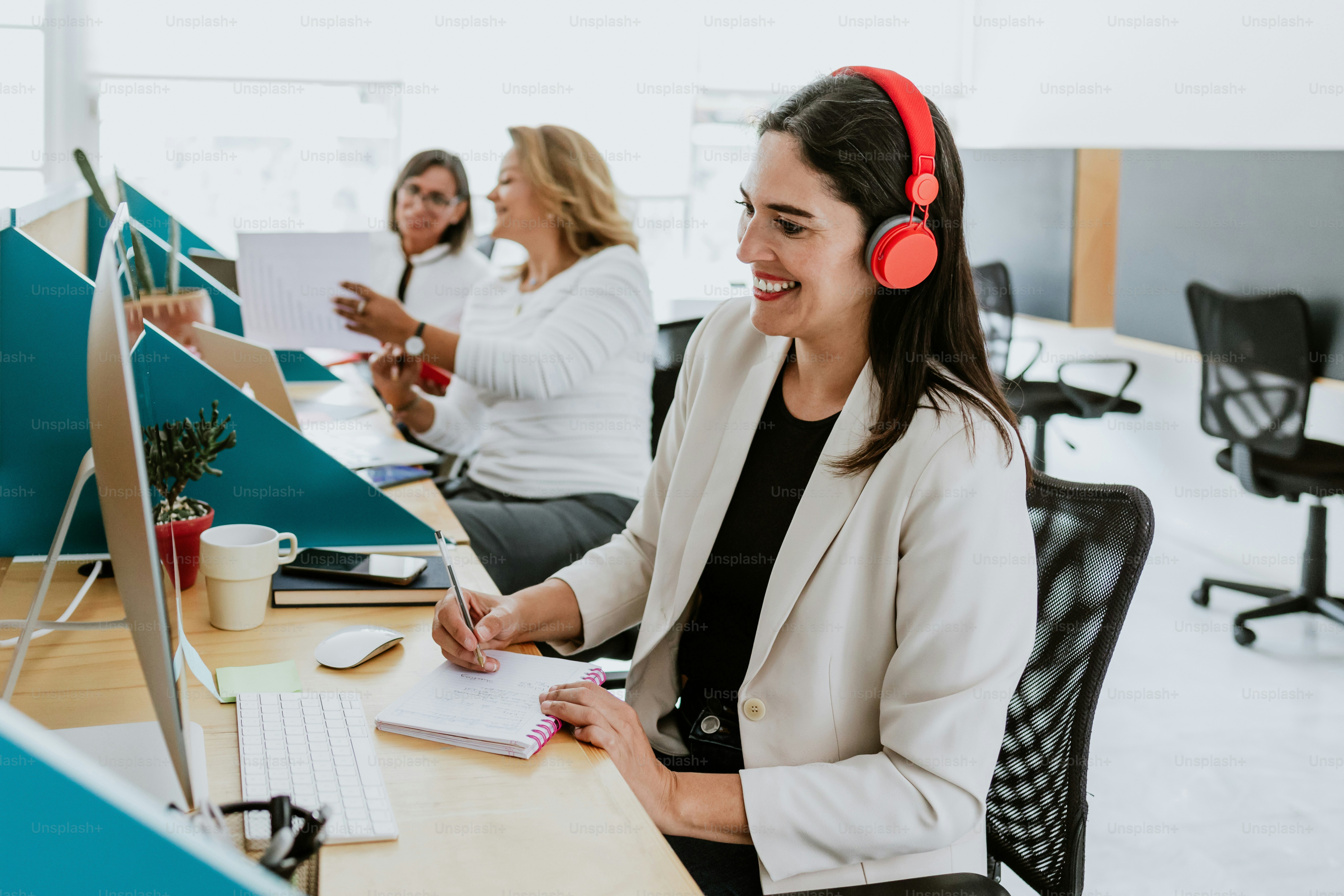 latin business adult woman working with computer at the office in Mexico Latin America
