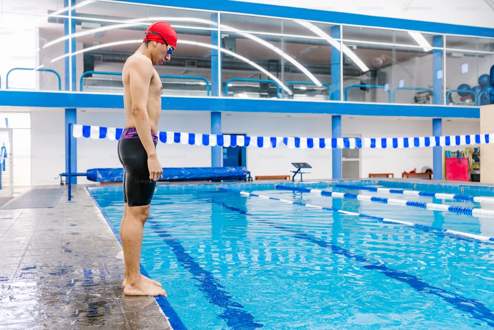 portrait of young latin man swimmer at the pool in Mexico Latin America