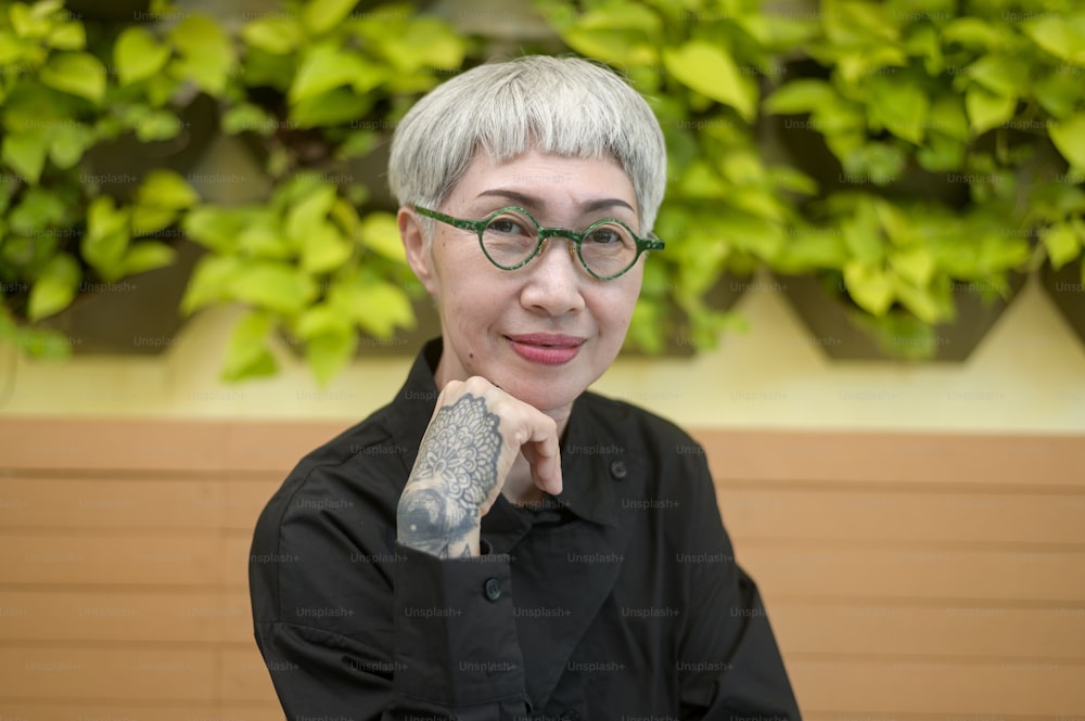 Portrait of senior businesswoman in coffee shop