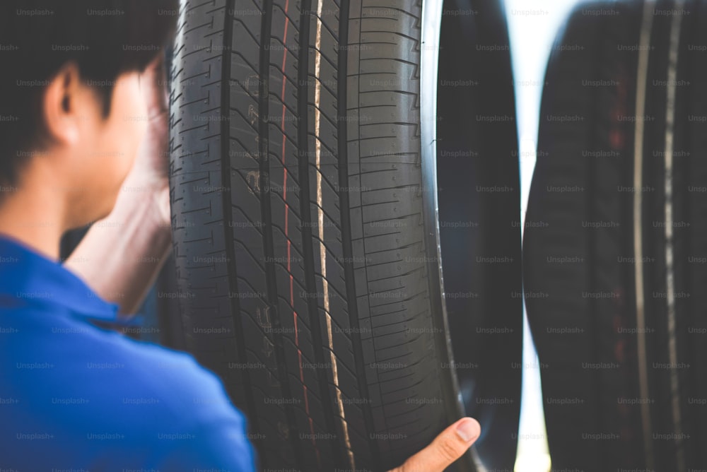 vehicle car tire business service automobile, buy and sell auto transport, rubber, store sale and repair, client buying in retail garage shop and mechanic man change a tyre wheel