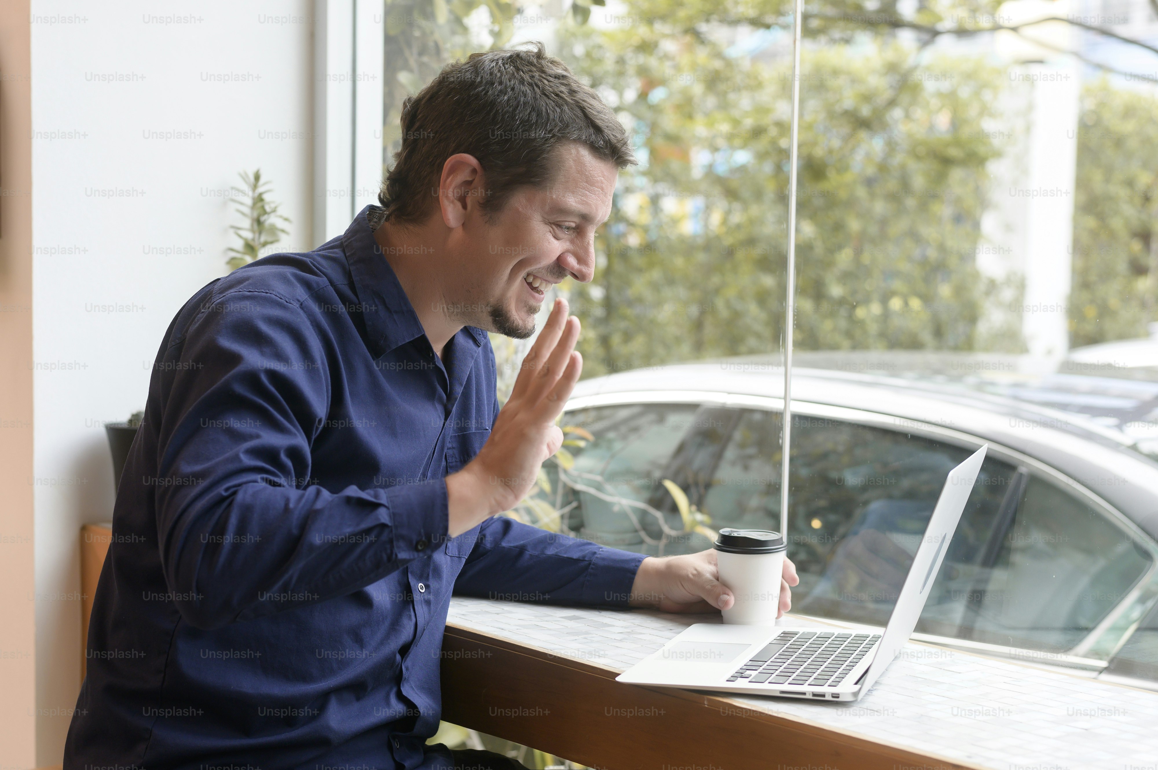 Portrait of business caucasian man in coffee shop