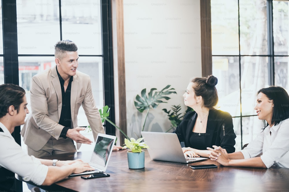 Business coworkers discussing new ideas and brainstorming in a modern office