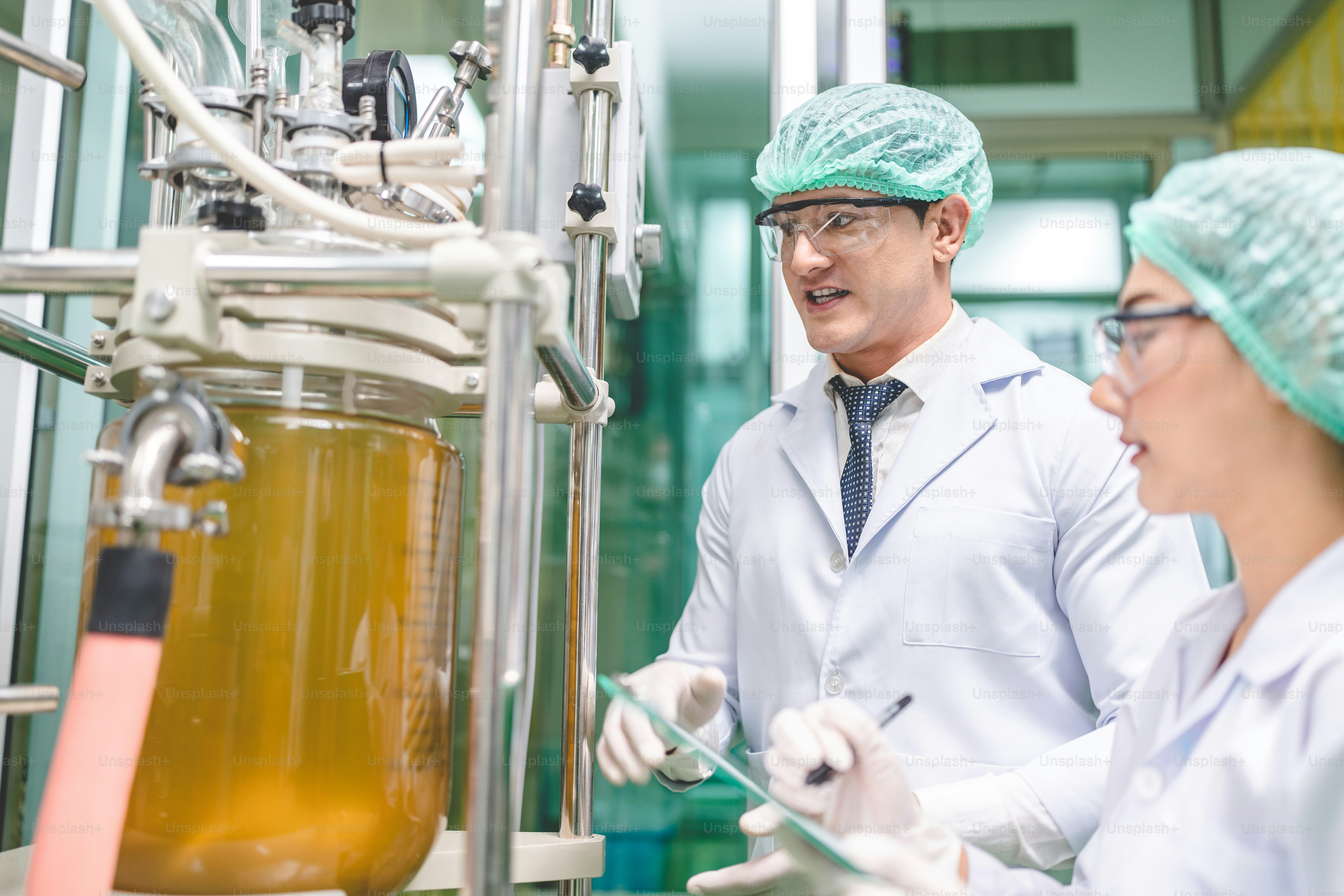 scientist checking on organic cannabis hemp plants in a weed greenhouse. Concept of legalization herbal for alternative medicine with CBD oil, commercial Pharmaceptical medicine business industry