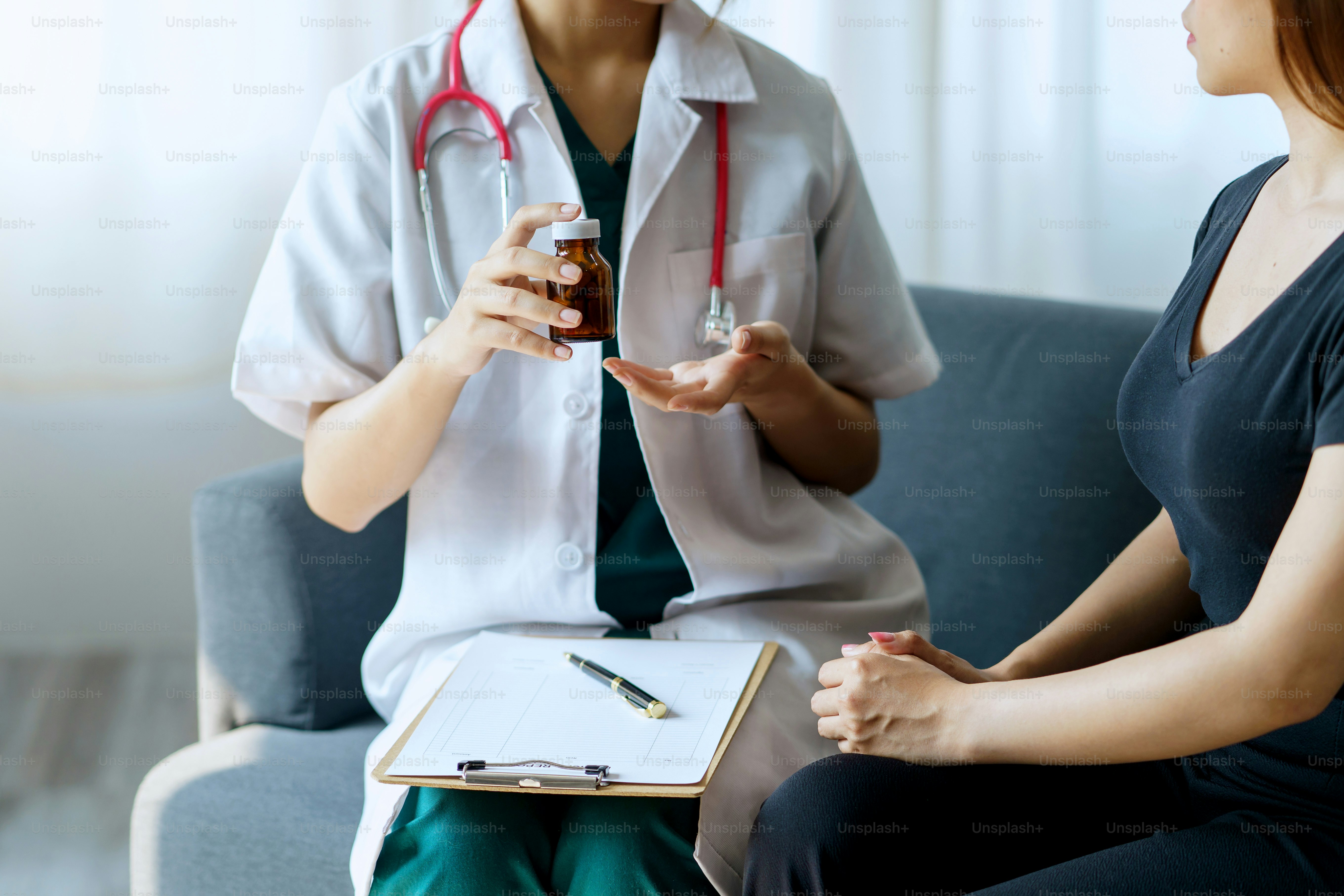 Female doctor asks about the patient's condition and makes recommendations about medications and disease treatment.