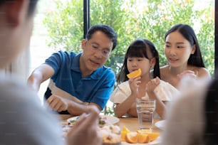 Asian family having a happy meal