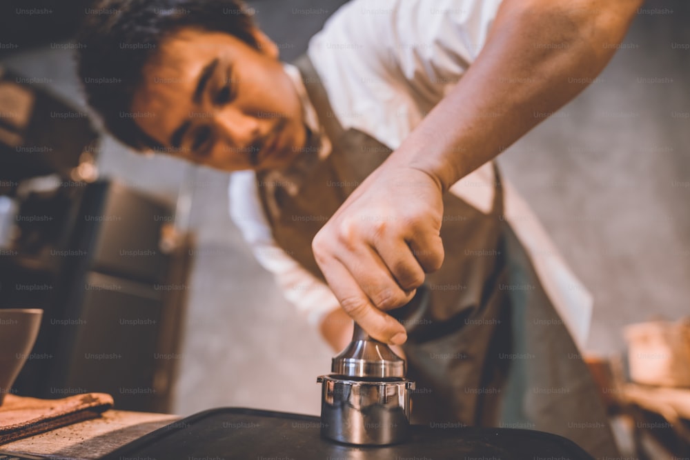 professional barista making hot drink of a fresh coffee in vintage cafe, cup of brown aroma hot espresso, beverage caffeine for morning, coffee bean and breakfast background