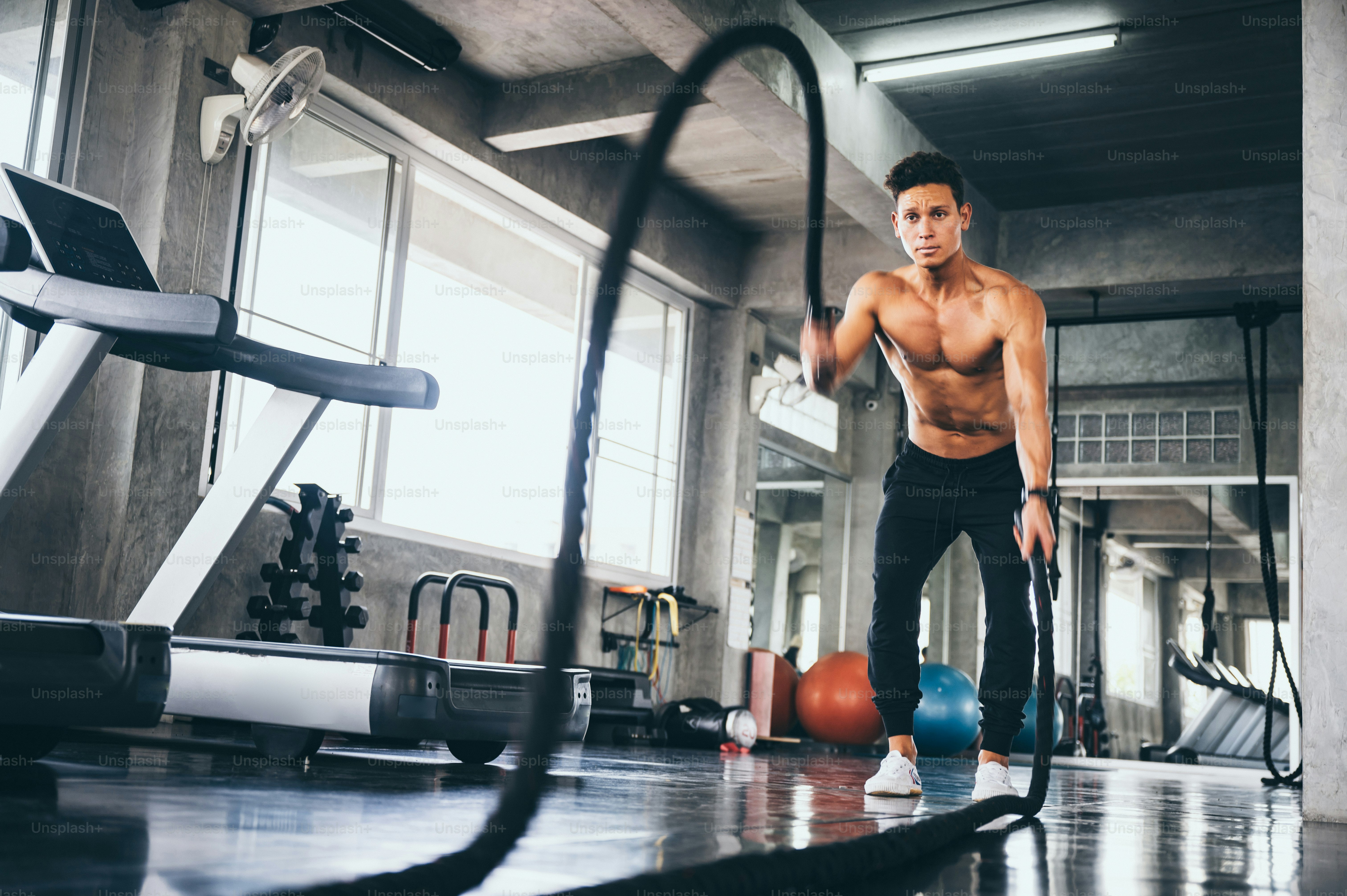 Strong man exercising in the sport gym photo – Shape Image on Unsplash