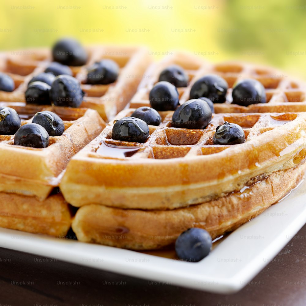 waffles with blueberries shot close up with selective focus.