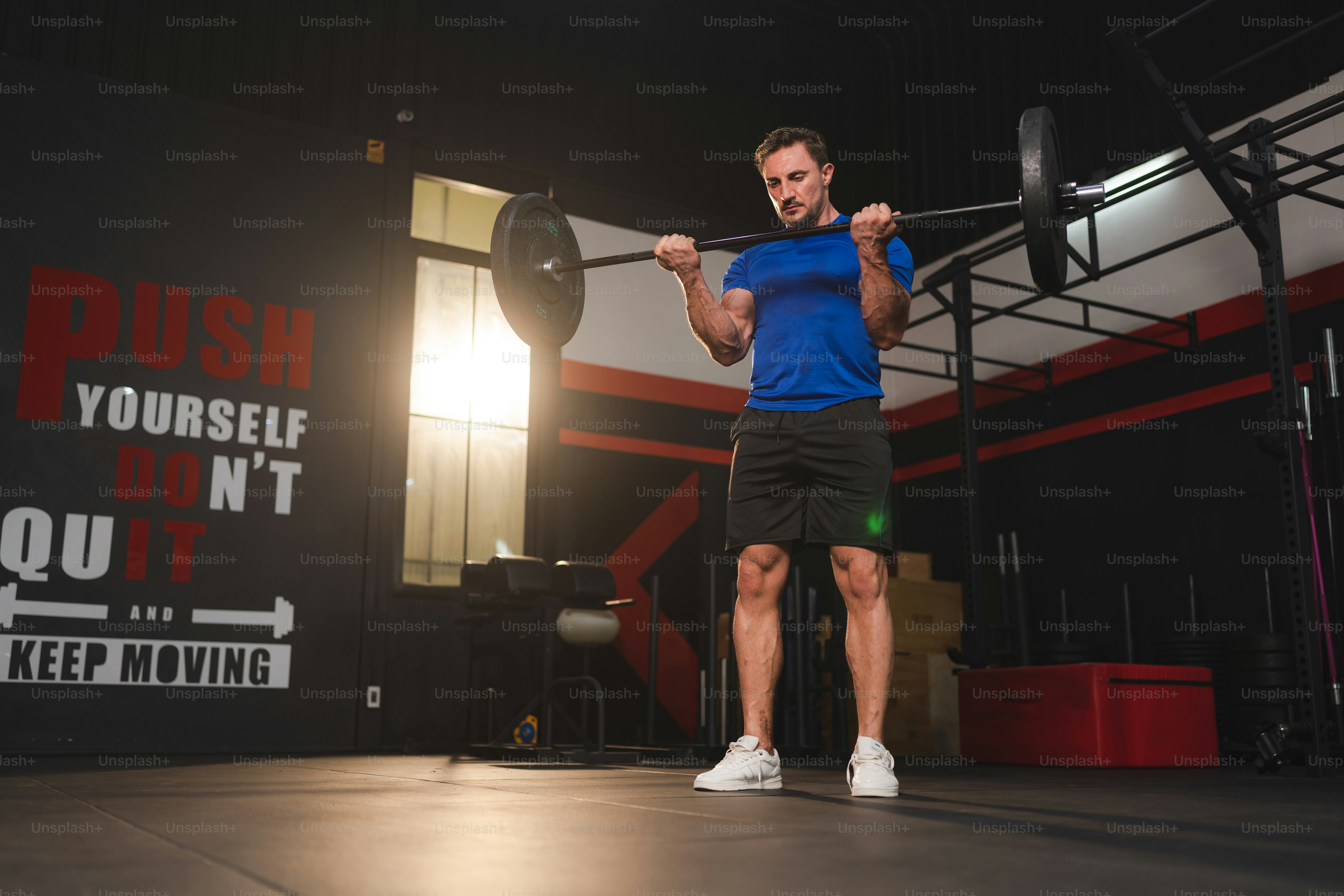 Strong athlete caucasian man person exercising in the sport gym ...
