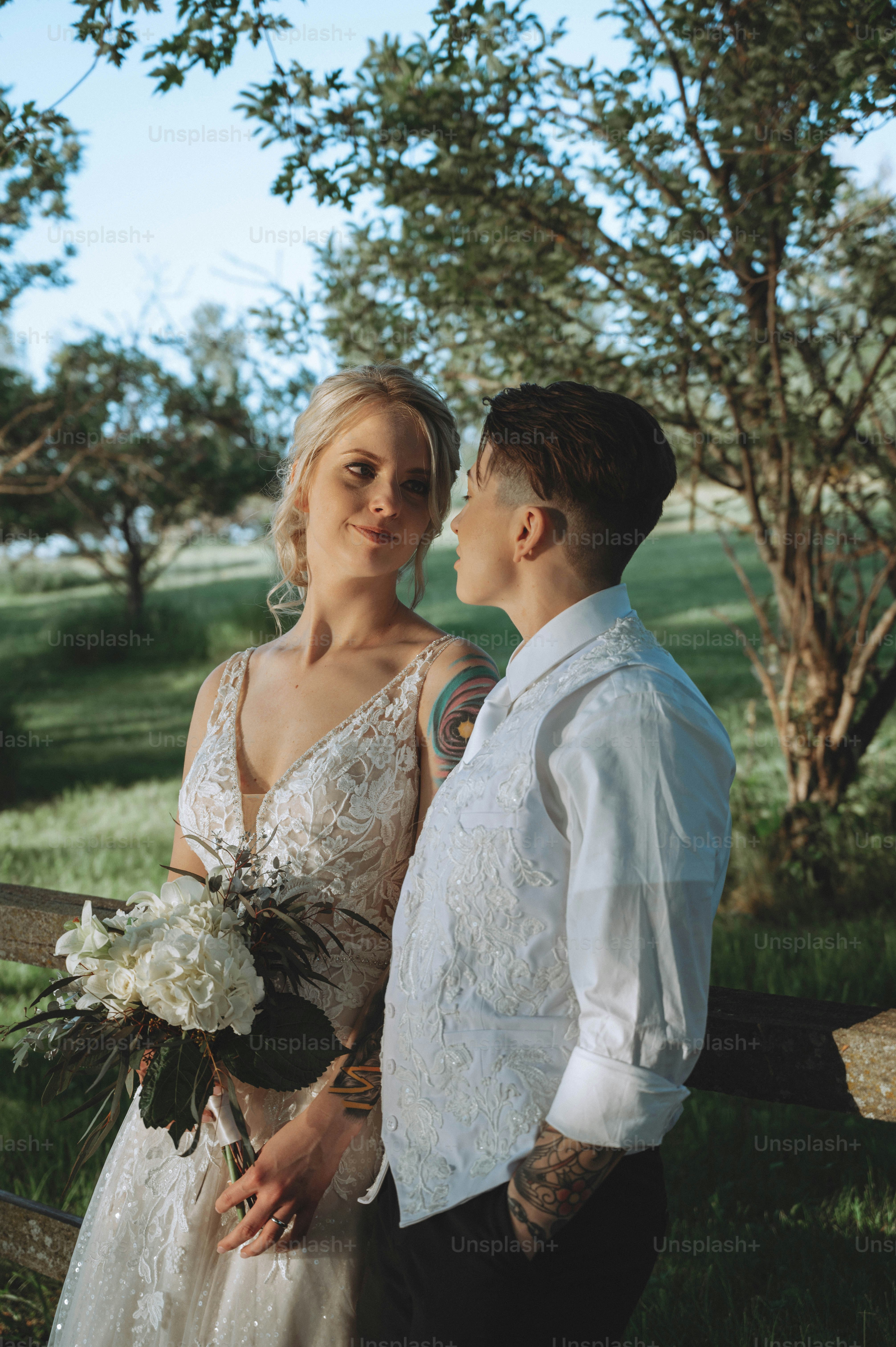 a man and a woman standing next to each other